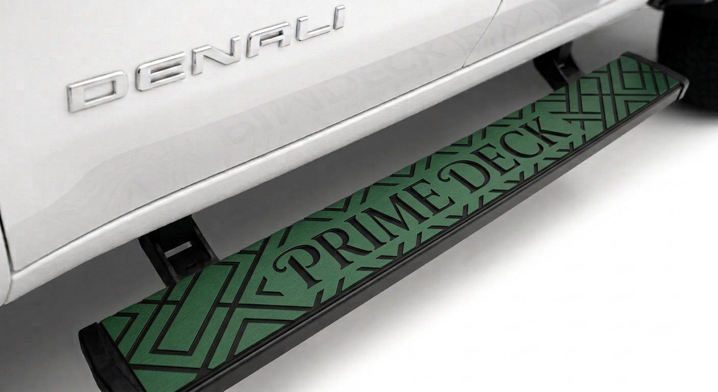 A close-up of a green and black step deck installed under a white vehicle, with the word 'DENALI' visible on the car and 'PRIME DECK' printed on the step.